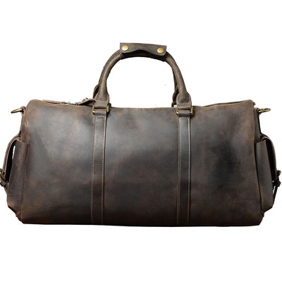 back view of a leather travel duffle bag, brown color
