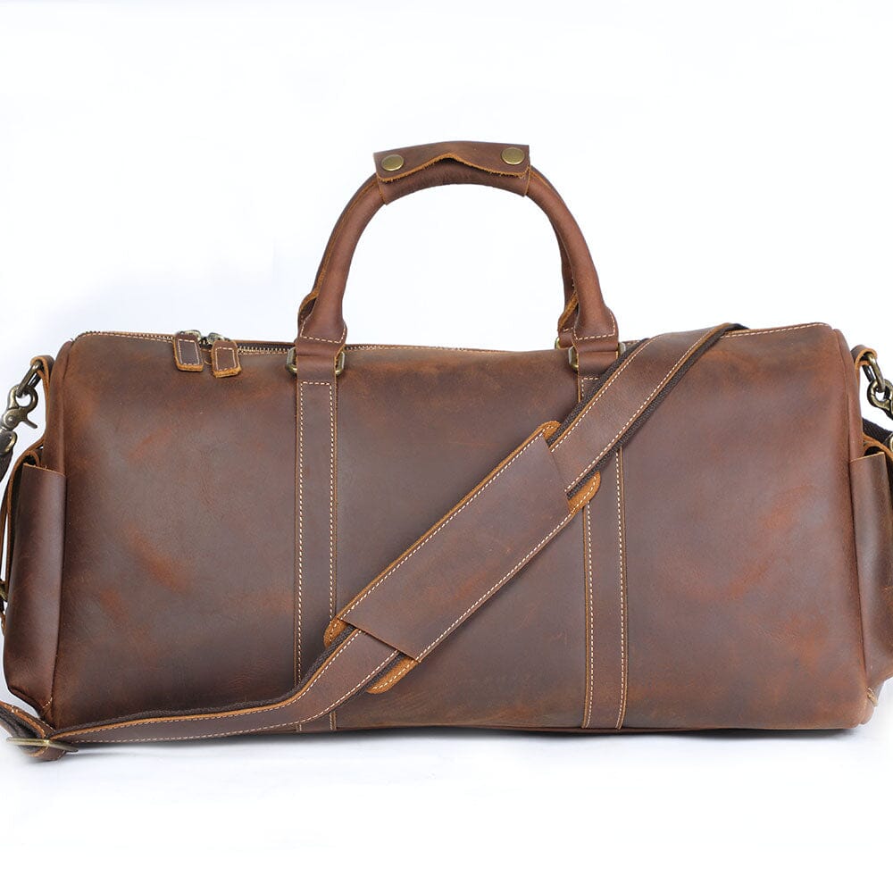 back view of a leather travel duffle bag, coffee color