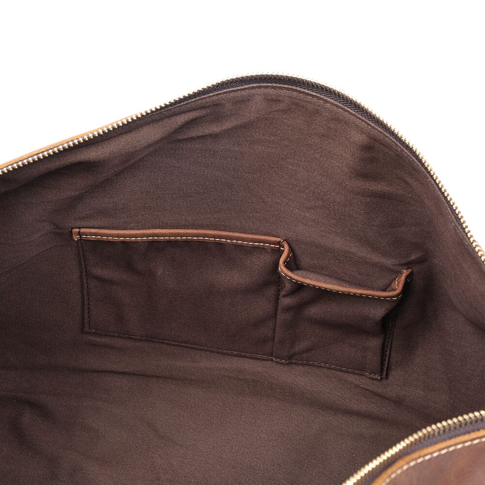 roomy and handy interior slot pockets of a leather duffel bag