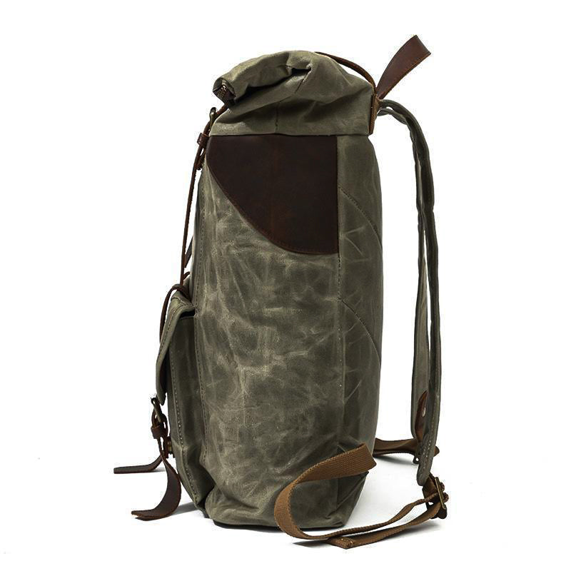 light green canvas carry on backpack