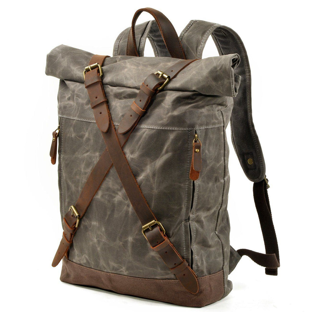 Side profile of the Oslo rucksack backpack showing slim depth and adjustable cotton canvas shoulder straps