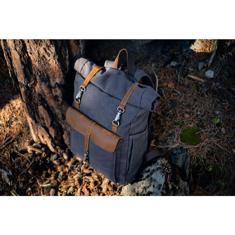 a retro rucksack on a pine floor