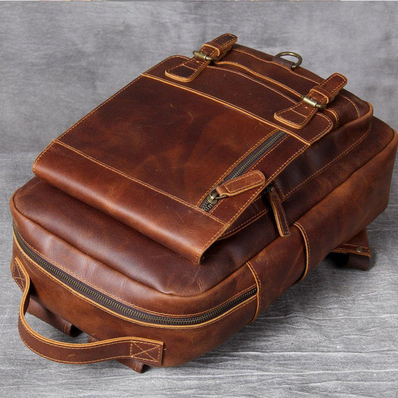 small brown leather backpack