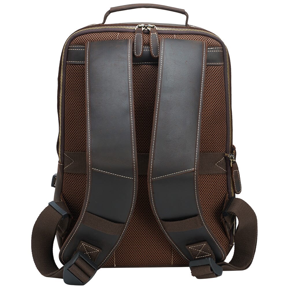 brown travel leather backpack with reinforced leather shoulder strap and sunglasses strap