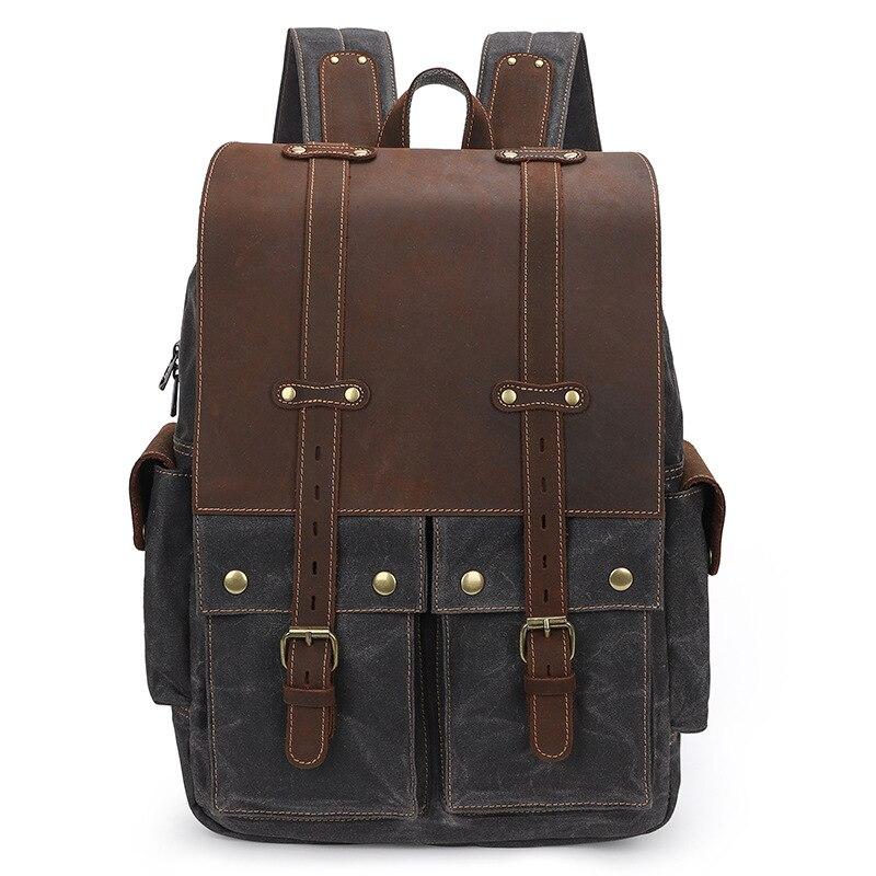 Urban backpack in dark grey with crazy horse leather flap, twin leather straps and brass buckle closure, Eiken Hoorn model