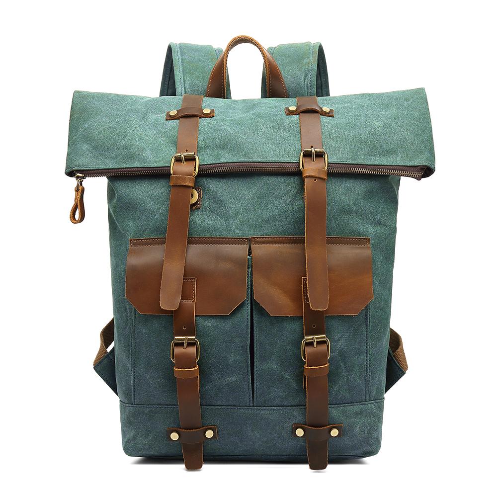 Waterproof rucksack in emerald with waxed canvas body, crazy horse leather flap and water-resistant treatment, Eiken Galway model