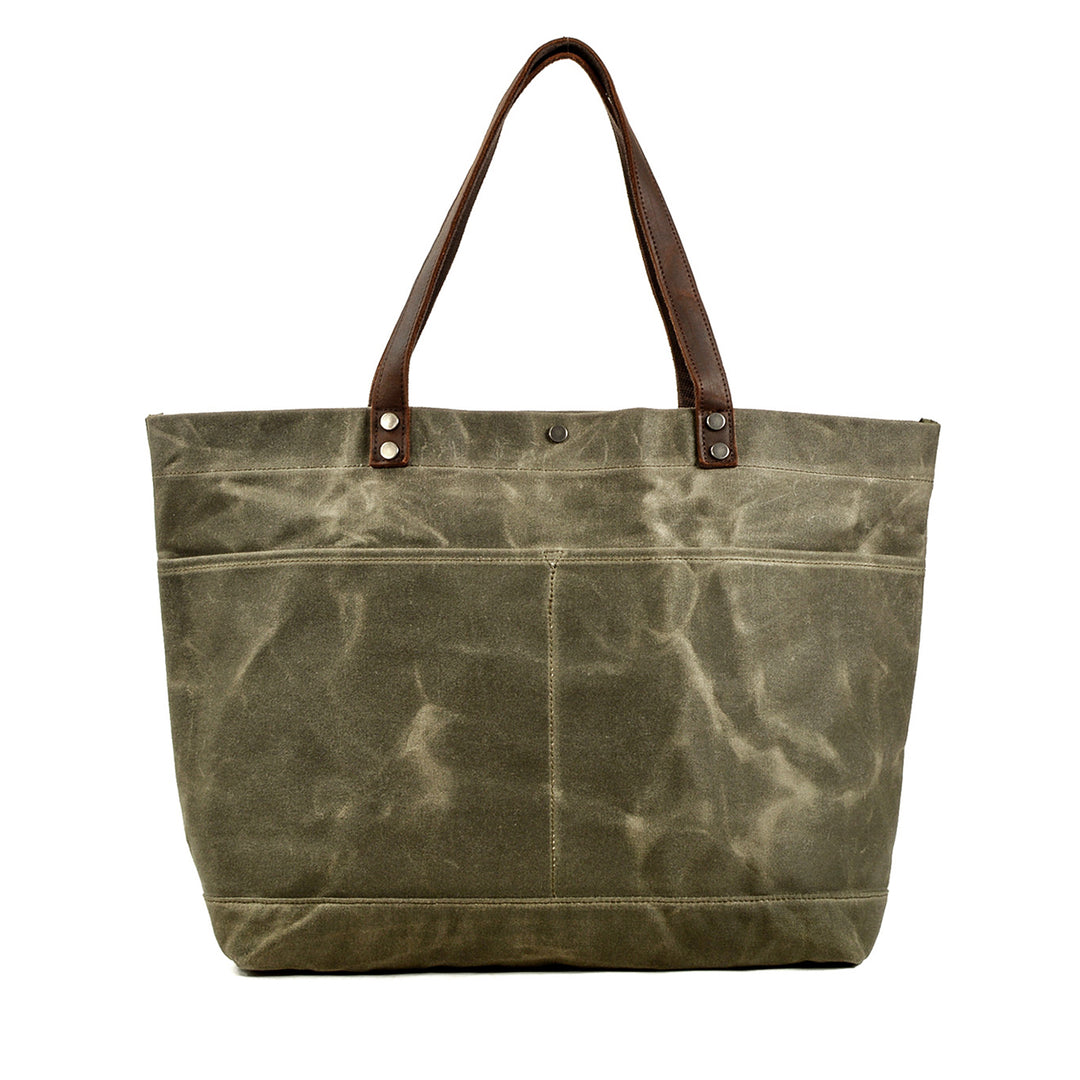 Heritage Waxed Canvas Laptop Bag Embroidered With a 'Animalia Beetle' design - available shops in Black or Olive Green