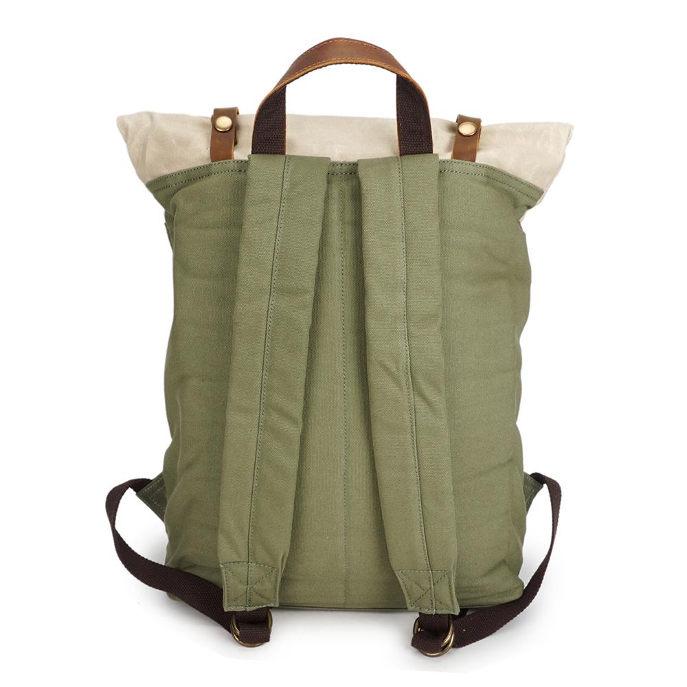 Yukon vintage canvas rucksack styled as a bookbag with leather flap and twin brass buckle straps